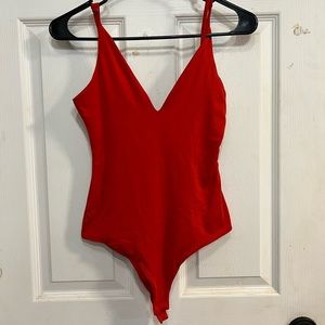 red bodysuit